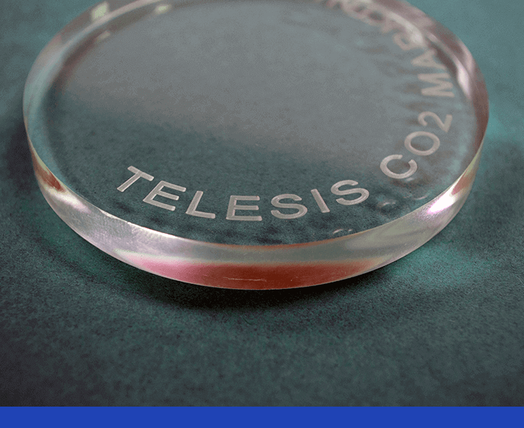 Glass marked to say "Telesis CO2 Marking"